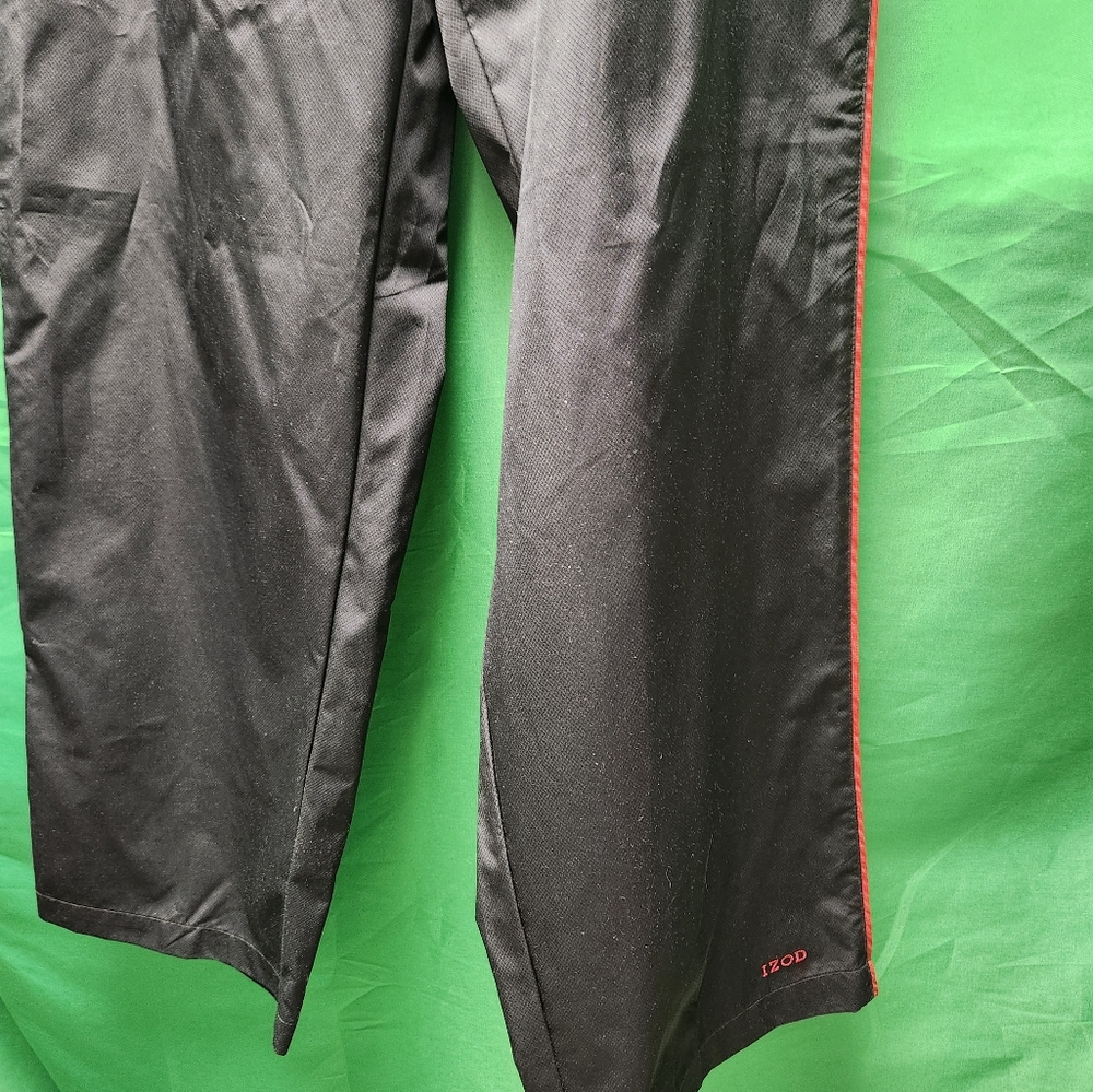 Womans Izod golf pants large windbreaker pants dark blue with red stripes